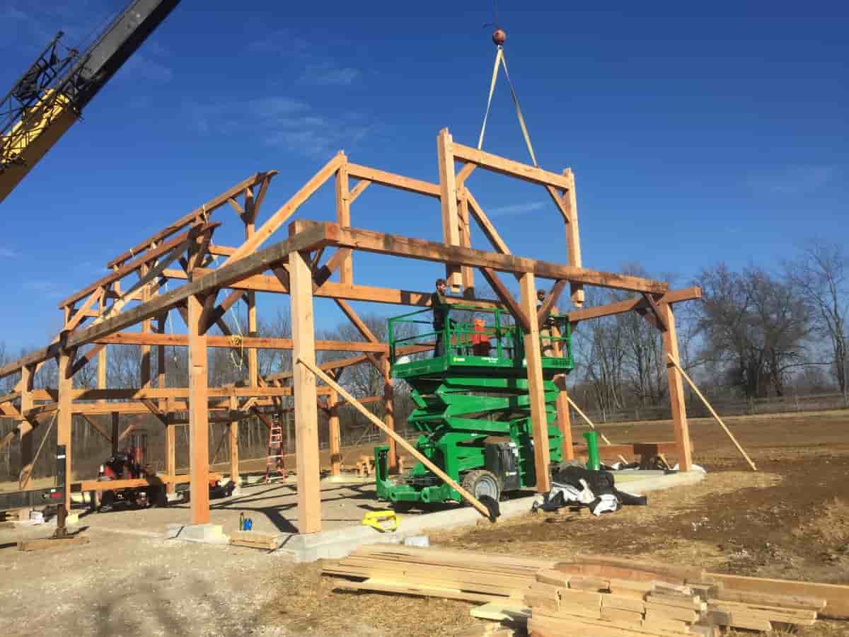 Timber frame being raised