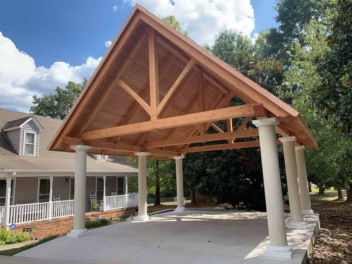 Timber frame carport with T&G and columns