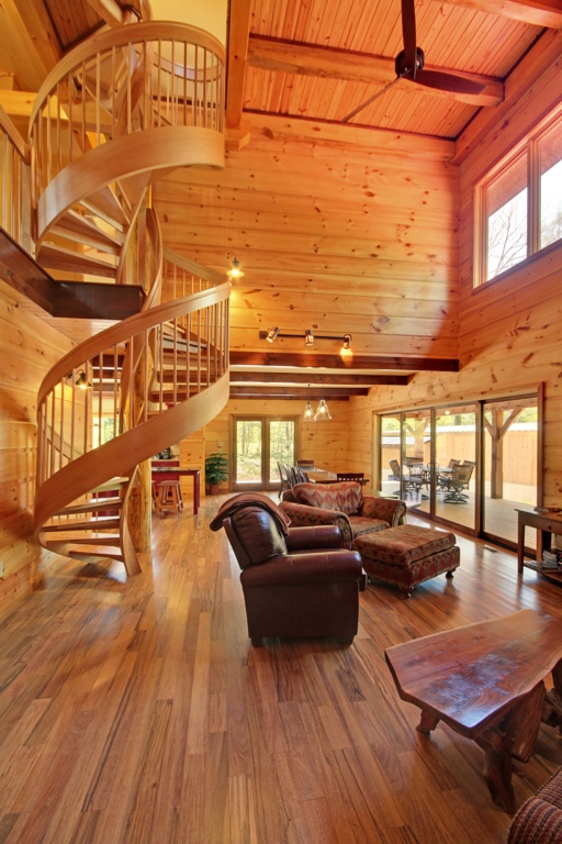 Timber frame interior with spiral staircase