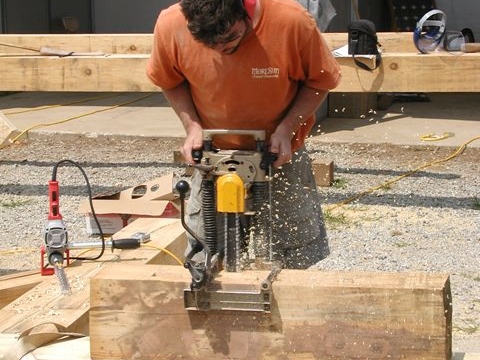 Cutting timber with chain saw mortiser