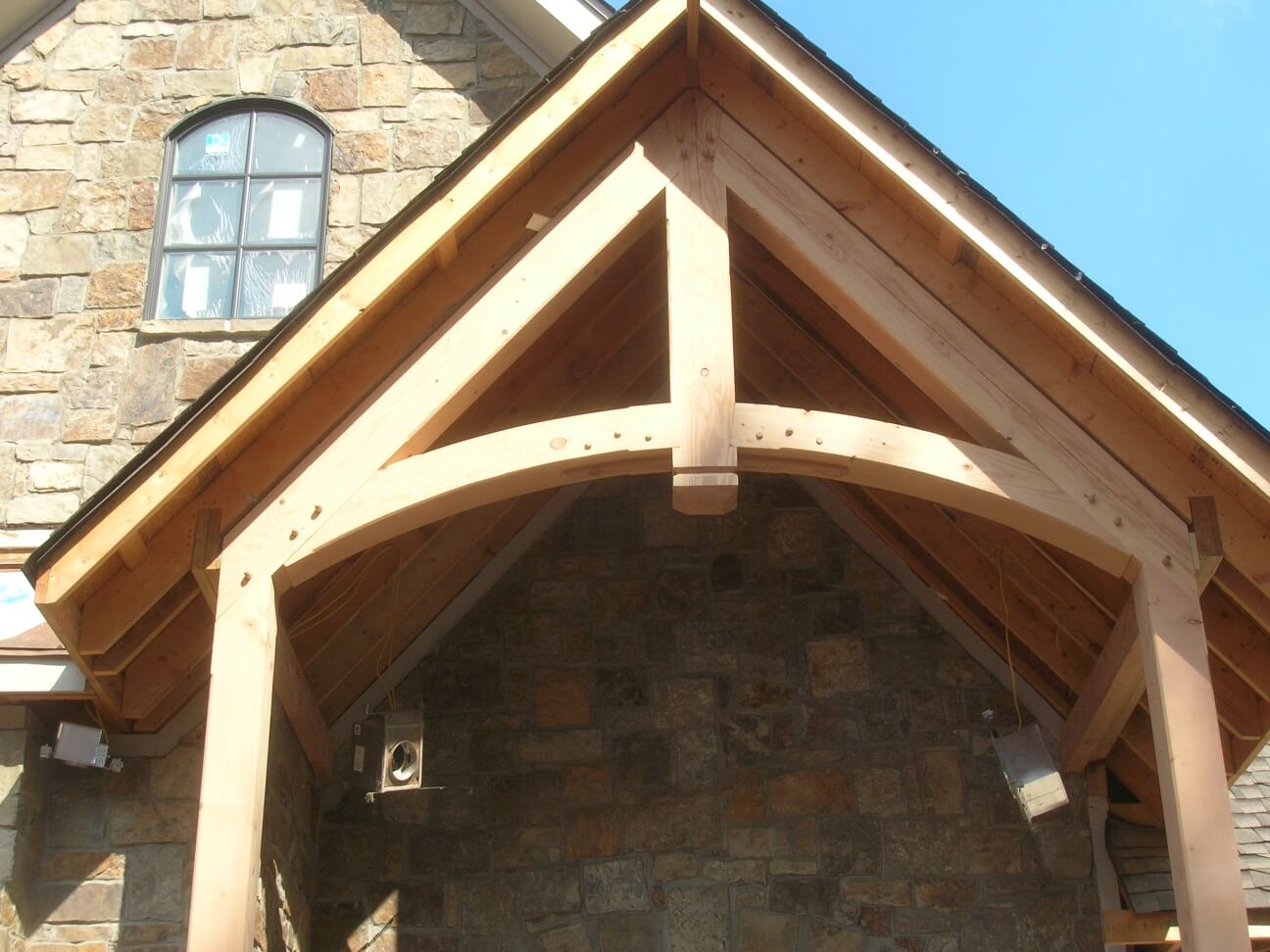 Kentucky timber frames curved entry porch truss