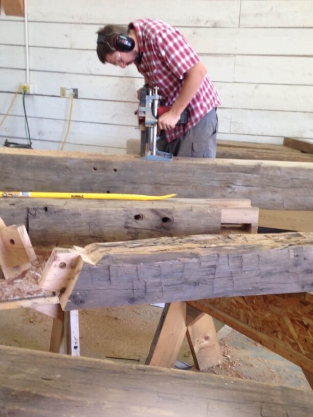 cutting a mortise in a timber frame truss