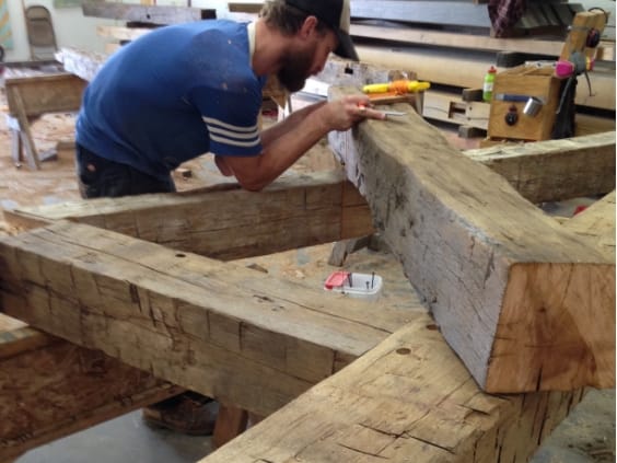 truss layout on a hand hewn timber
