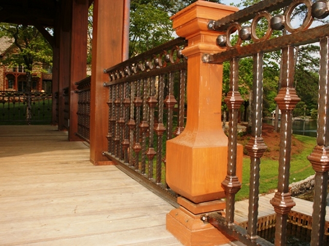 wood balusters with metal railings
