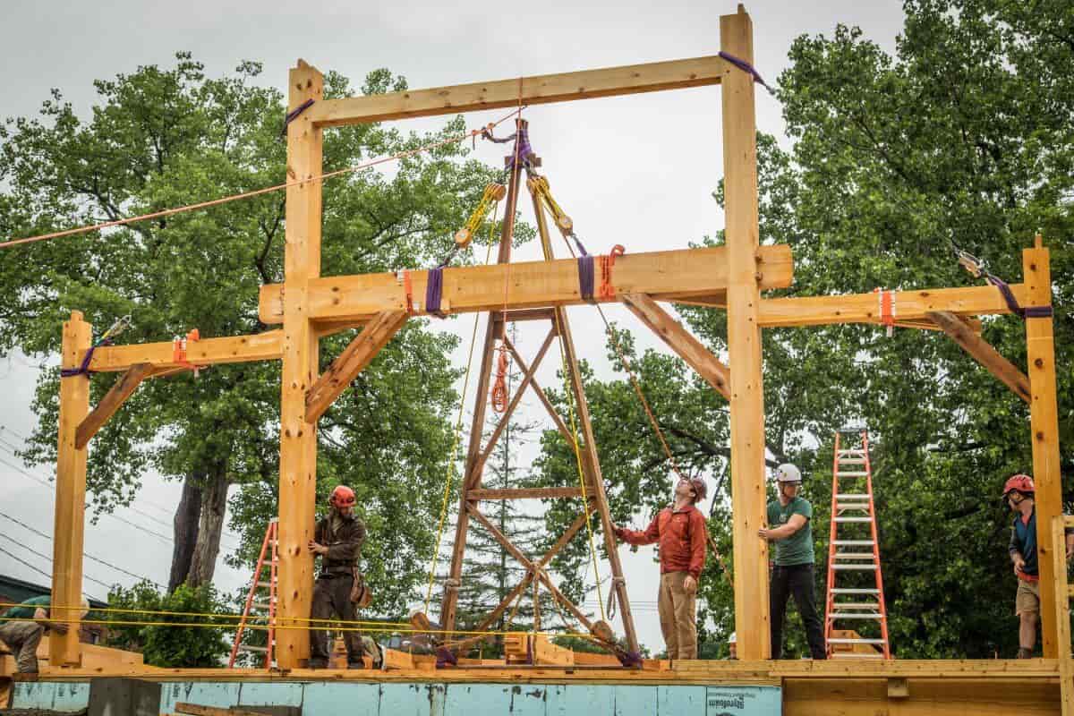 Timber frame being raised