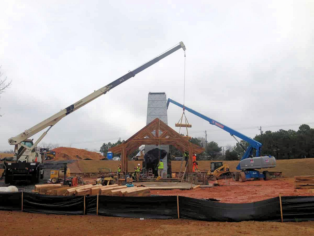 Raising timber frame with crane