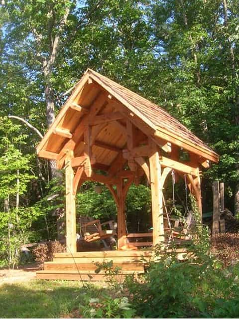 back yard timber frame with swings