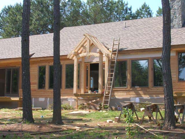 Covered timber frame entry porch