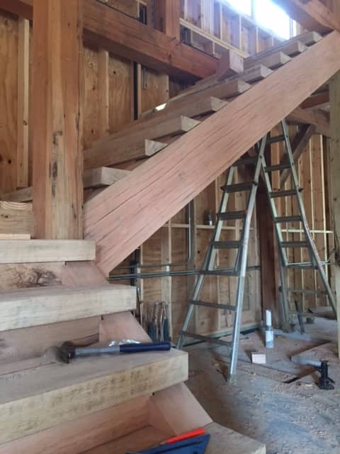 Stairs in timber frame barn
